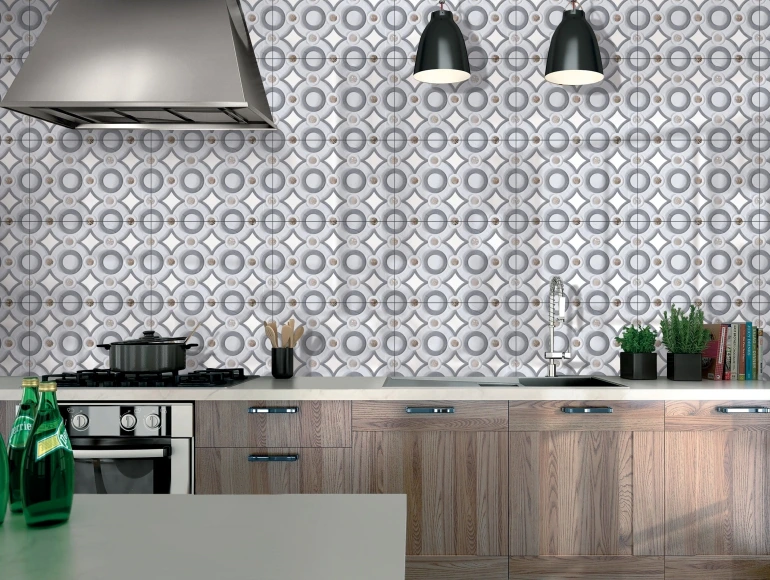 A modern space with geometric grey tiles for kitchen backsplash design.